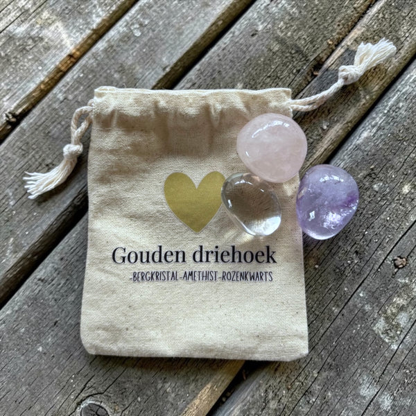Gouden driehoek in linnen zakje