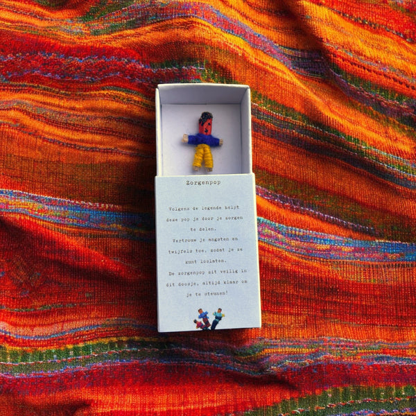 Schachtel mit Sorgenpuppe