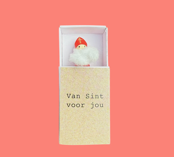 Weihnachtsmann in einer Schachtel