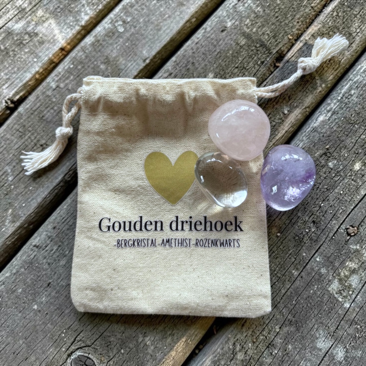 Gouden driehoek in linnen zakje