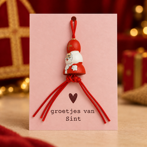 Roze kaart Groetjes van Sint met lusje door het middelste gaatje